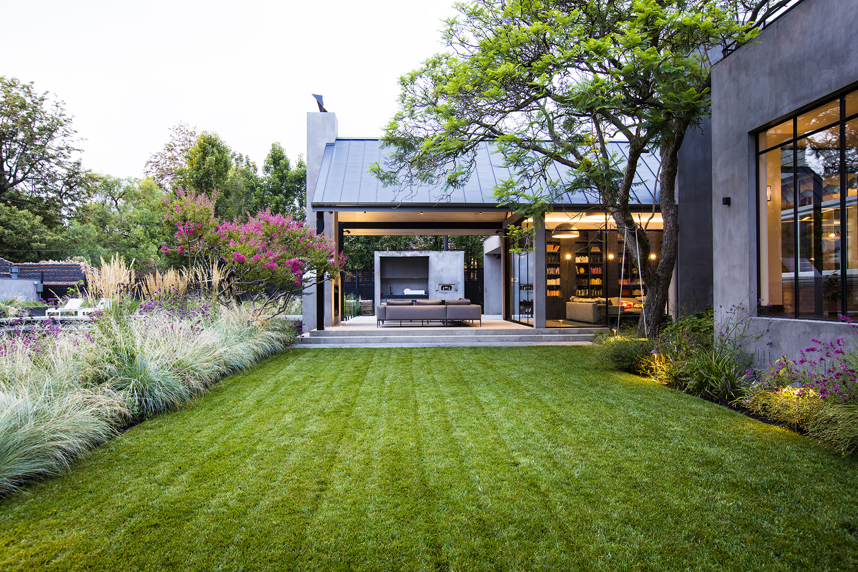 Lush garden with a neatly maintained lawn and layered planting